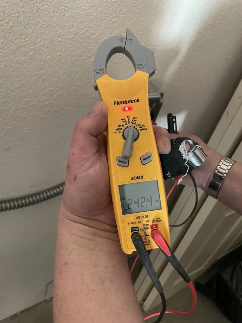 Voltage testing with clamp meter during Generator Installation in Gridley